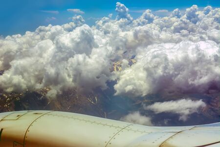 Passenger airplane in the clouds.の写真素材