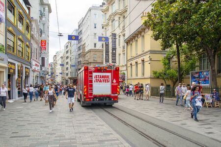 Turkey June 15, 2019: Nostalgic Red Tram in Taksim Istiklal Street at evening. Taksim Istiklal...