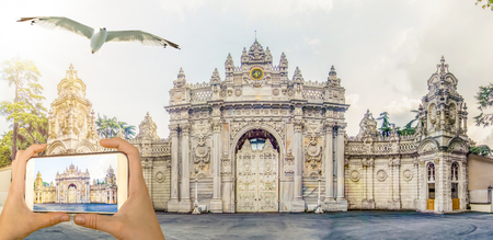 Tourist taking a picture of Dolmabahce Palace Istanbul, Turkey. Travel conceptのeditorial素材