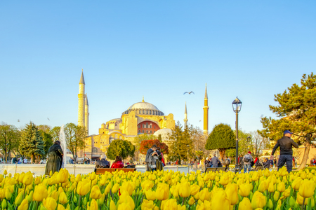 Istanbul Turkey - April 04, 2019: Hagia Sophia is seen behind the tulips and fountain at Sultan Ahmet Square in Istanbul, Turkeyのeditorial素材