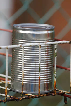 A Tin on a Rusty iron frameの写真素材
