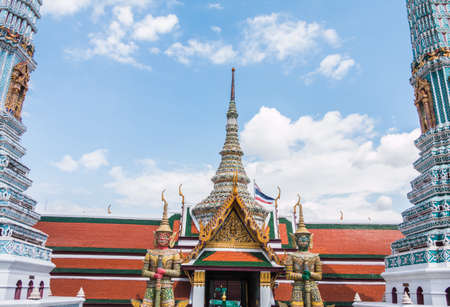 Red and Green Giant Guardian blue sky  in Wat Phra Kaew temple ,bangkok,thailandの写真素材