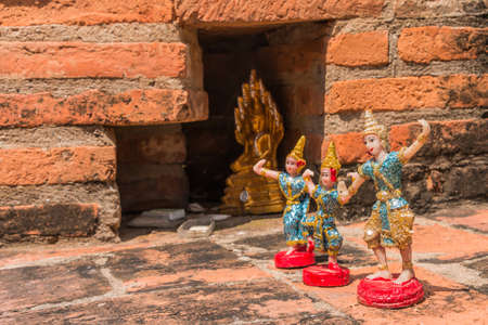 Toy Angel Doll Buddha Status at Wat Yai Chaimongkol, Ayutthaya, Thailandの写真素材