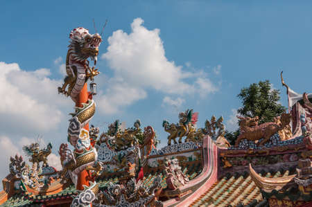 Chinese dragon on the red pole at Wat Phananchoeng, Ayutthaya, Thailandの写真素材