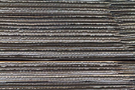 Texture of stacked corrugated cardboardの写真素材