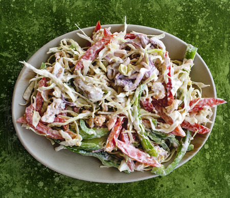 seafood salad with vegetables and mayonnaise in a bowlの写真素材