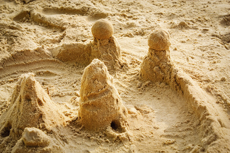 sandcastle on the beach closeupの写真素材