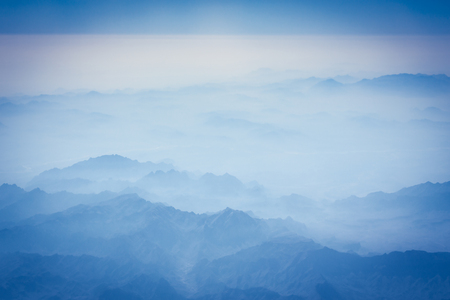 mountains in the mist aerial viewの写真素材