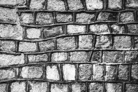 black and white stone wall backgroundの写真素材