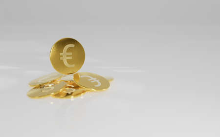 The gold coin lies on a solid background. Background for banks with currency. Euro dollar gold coinsの写真素材