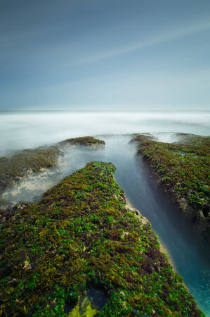 Misty waters of Ngobaran Beach, Wonosari, Yogyakarta, Indonesiaの写真素材