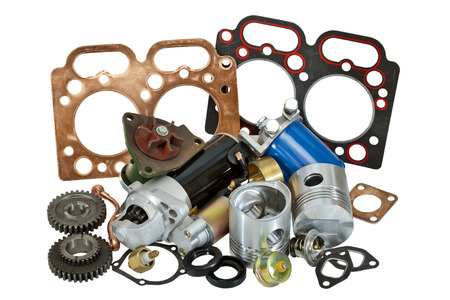 photo is a lot of spare parts on a white background