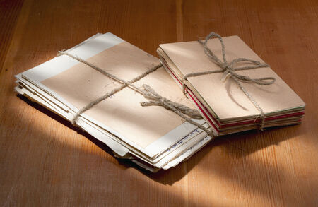 photo old letters two packs tied up by a twineの写真素材