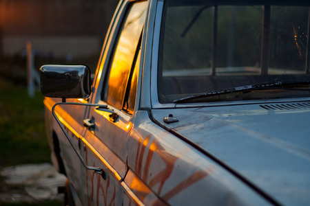 Old Truck with Graffiti at Sunsetの写真素材