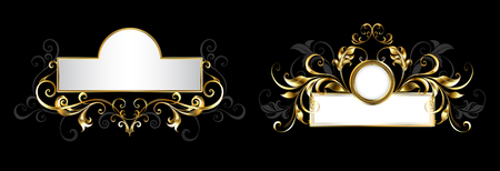 Two antique, ornate nameplates with patterned frame of gold and gray leaves on black background.