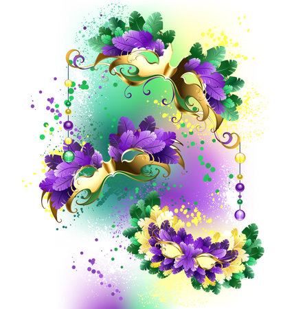 Composition of three carnival, golden Mardi Gras masks, decorated with purple and green fluffy feathers on light background, painted over with spots of bright yellow, white, green paint. Mardi gras mask.のイラスト素材