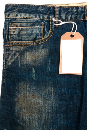 Blue jeans detail blank tag paper jeans label on white backgroundの写真素材