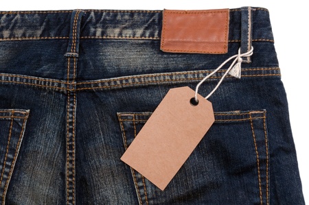 Blue jeans detail blank tag paper jeans label on white backgroundの写真素材