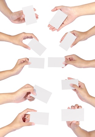 Collection of Beautiful woman hands holding an empty business card over white backgrounds.の写真素材