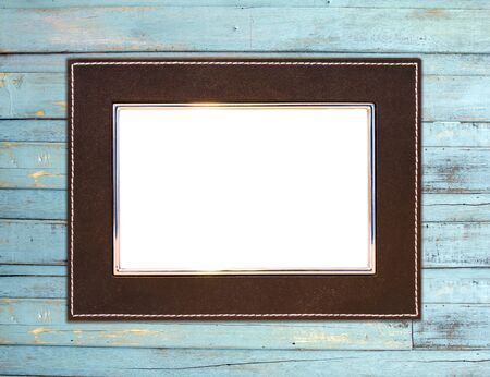Vintage picture frame, wood plated, blue wood backgroundの写真素材