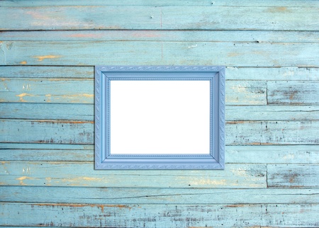 Gray Vintage picture frame, wood plated, blue wood backgroundの写真素材