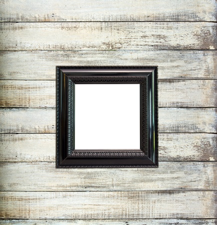 Black Vintage picture frame, wood plated, old wood backgroundの写真素材