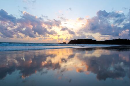 Tropical beach Sunset Sky With Lighted Clouds