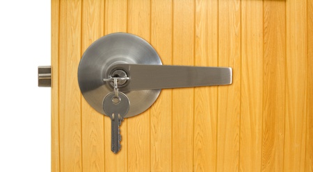 Aluminium door knob on the wood door white background の写真素材