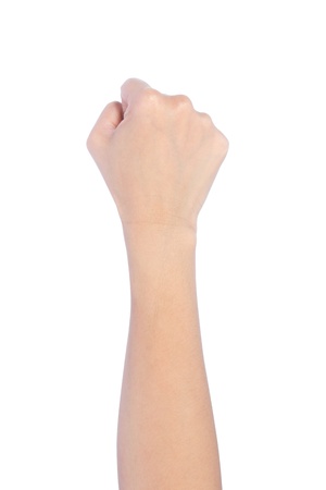 Powerful fist pump against woman hands a white backgroundの写真素材