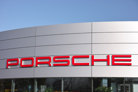 Essen, Germany - November 1, 2015: Car dealer of German automobile manufacturer Porsche AG owned by...