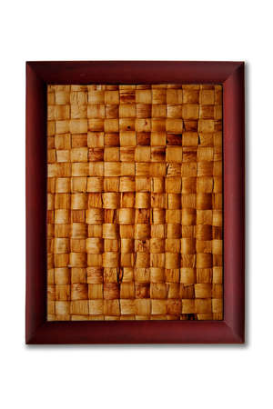 Texture of woven reed in wooden frameの写真素材