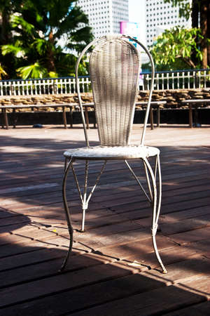 White chair on wooden floorの写真素材