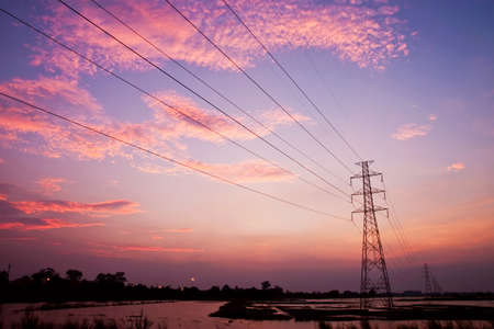 High voltage pole in sunsetの写真素材