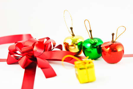 Red ribbon and gift boxes isolated on whiteの写真素材