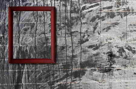 Wood frame on grunge chalk boardの写真素材