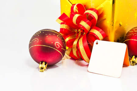 Gif box and x mas ball on whiteの写真素材