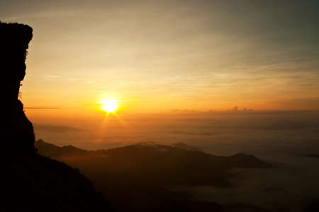 Morning sunshine over sea of fog in Thailandの写真素材