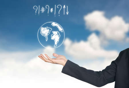Hand holding world map icon against blue sky