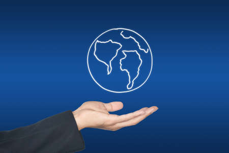 Hand and world map icon, on blue background