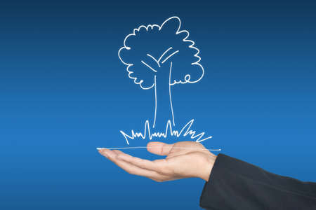 Hand and green plant icon, can be used for go green conceptの写真素材