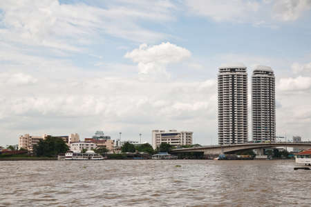 High building beside a big river, Thailandのeditorial素材