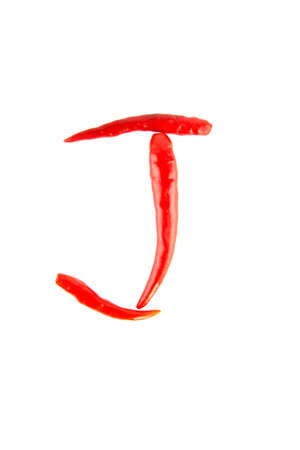 Red chilli J-Alphabet isolate on whiteの写真素材