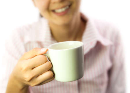 Business girl holding a cup of coffeeの写真素材