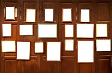 Grunge wooden photo frame on wooden wallの写真素材