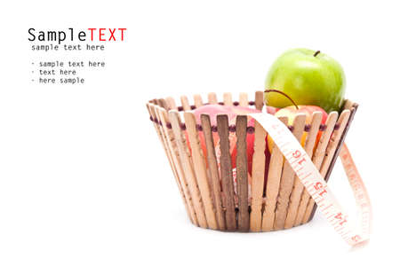 Apple fruit with measuring tape in wood basketの写真素材
