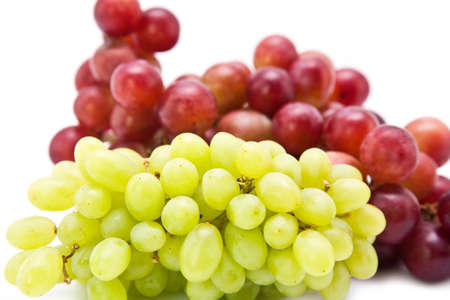 Green and red grape fruit, isolated on white backgroundの写真素材