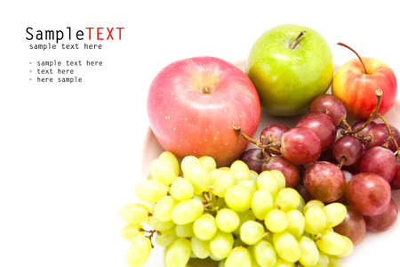 Grape and apple fruits isolated on white backgroundの写真素材