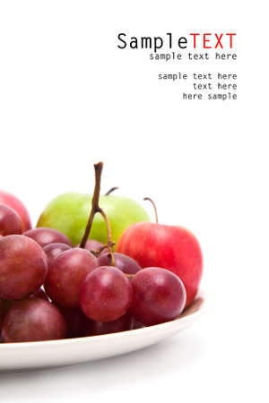 Apple and grape fruits, on white backgroundの写真素材