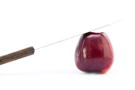 Red apple and knife, isolate on whiteの写真素材