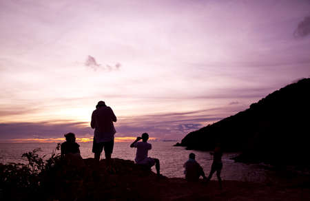 silhouette peoples against sunset backgroundの写真素材